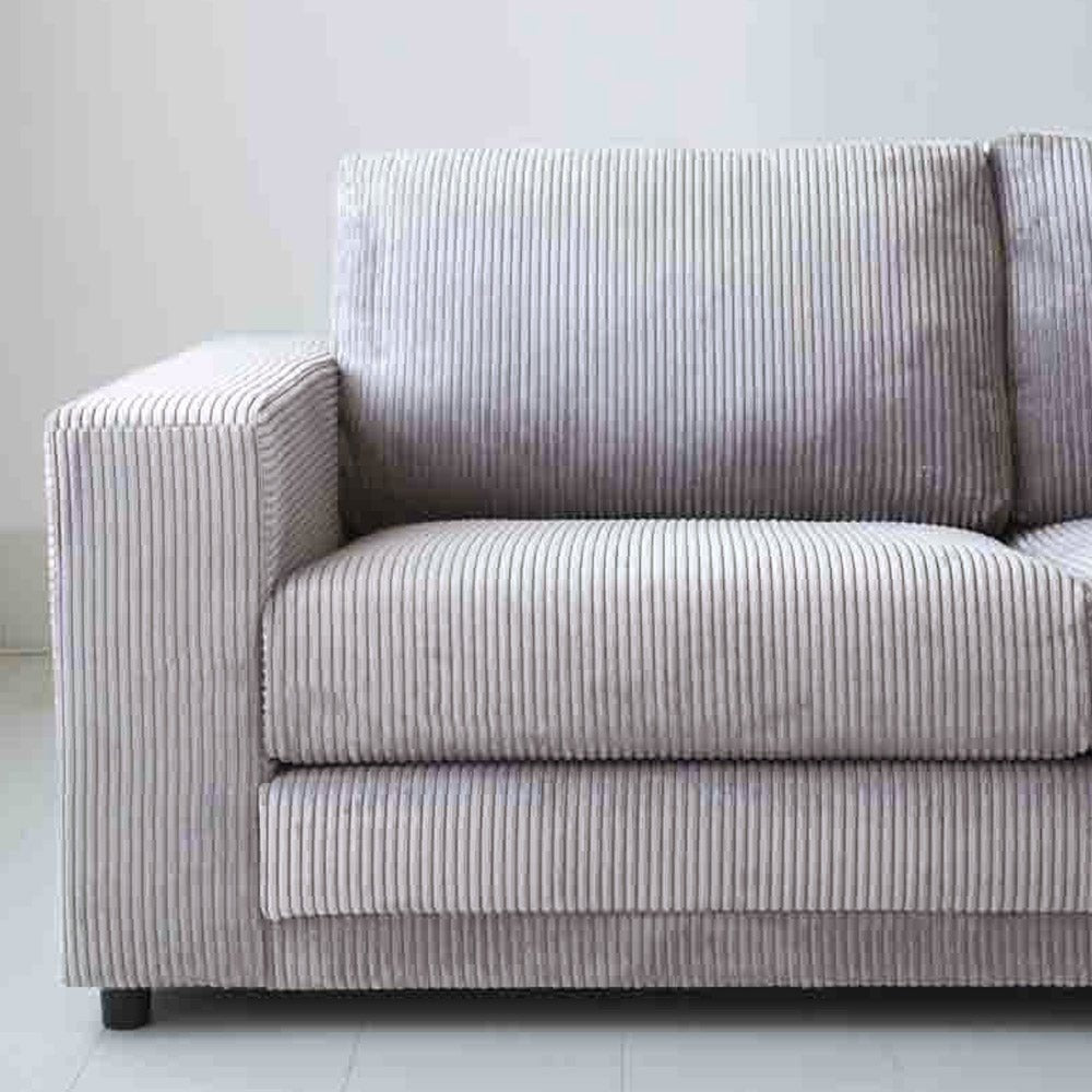 L-formet hjørnesofa i lysegråt ribstof med chaiselong Gabi - højre