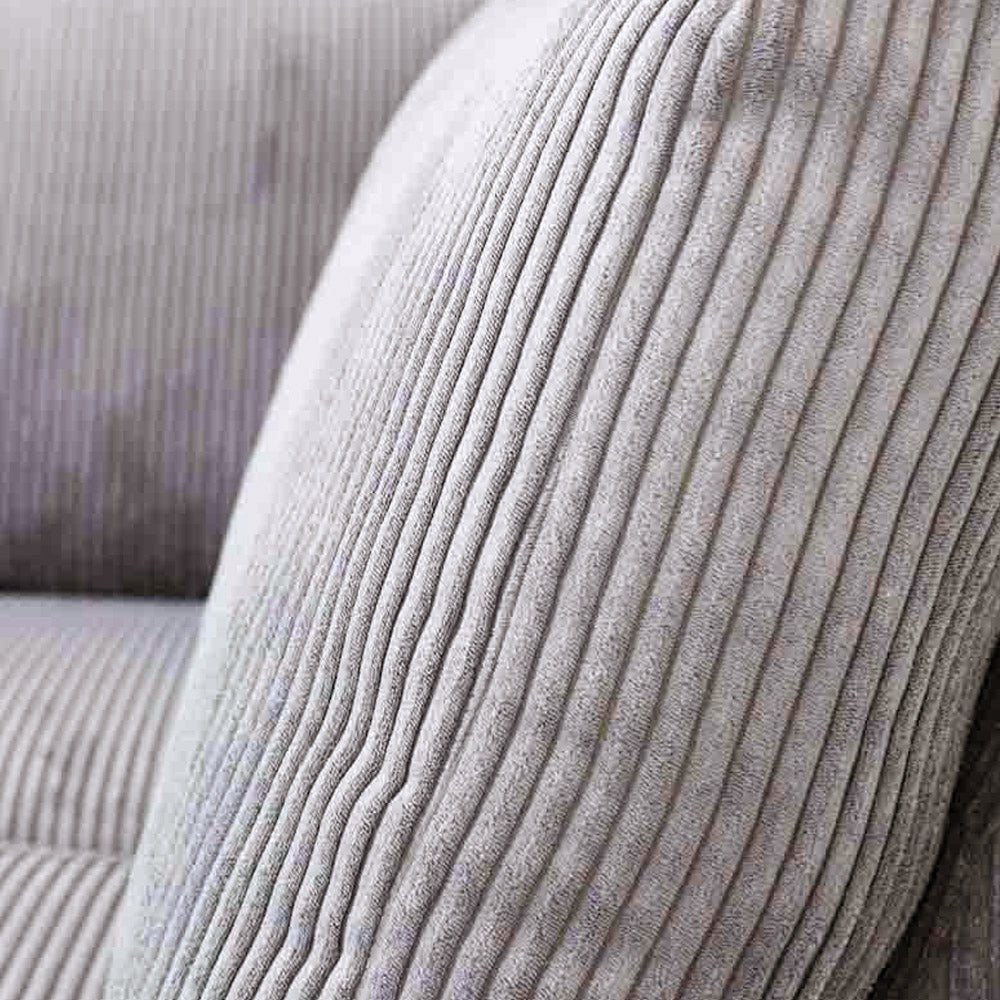 L-formet hjørnesofa i lysegråt ribstof med chaiselong Gabi - højre