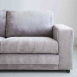 Hjørnesofa lysegrå ribstof puffebord Gabi - venstre 