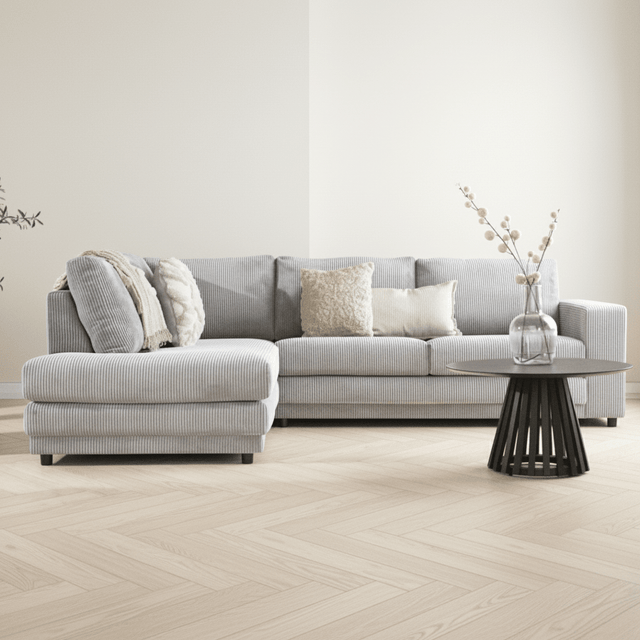 Hoekbank lichtgrijs ribstof plofbank Gabi - links