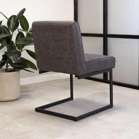 Spisestuestol Nathan Dimehouse Antracit LxBxH 75x62x56 Stof Atmosfærisk foto diagonalt set bagfra