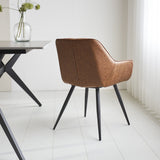 Spisestuestol Cara Dimehouse Cognac LxBxH 78x65x57 Kunstlæder Atmosfærisk foto diagonalt set bagfra