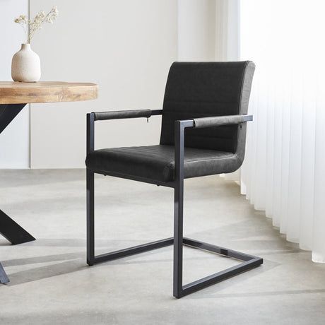 Spisestuestol Kuba Dimehouse Antracit LxBxH 71x59x58 Kunstlæder Atmosfærisk foto diagonalt set forfra