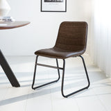 Spisestuestol Mark Dimehouse Taupe LxBxH 74x56x54 Kunstlæder Atmosfærisk foto diagonalt set forfra