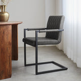 Spisestuestol Ruben Dimehouse Antracit LxBxH 71x59x58 Kunstlæder Atmosfærisk foto set fra siden