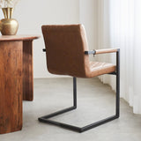 Spisestuestol Ruben Dimehouse Cognac LxBxH 71x59x58 Kunstlæder Atmosfærisk foto diagonalt set bagfra