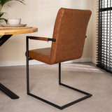 Spisestuestol BH Dimehouse Cognac LxBxH 73x59x58 Kunstlæder Atmosfærisk foto diagonalt set bagfra