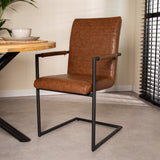 Spisestuestol BH Dimehouse Cognac LxBxH 73x59x58 Kunstlæder Atmosfærisk foto diagonalt set forfra